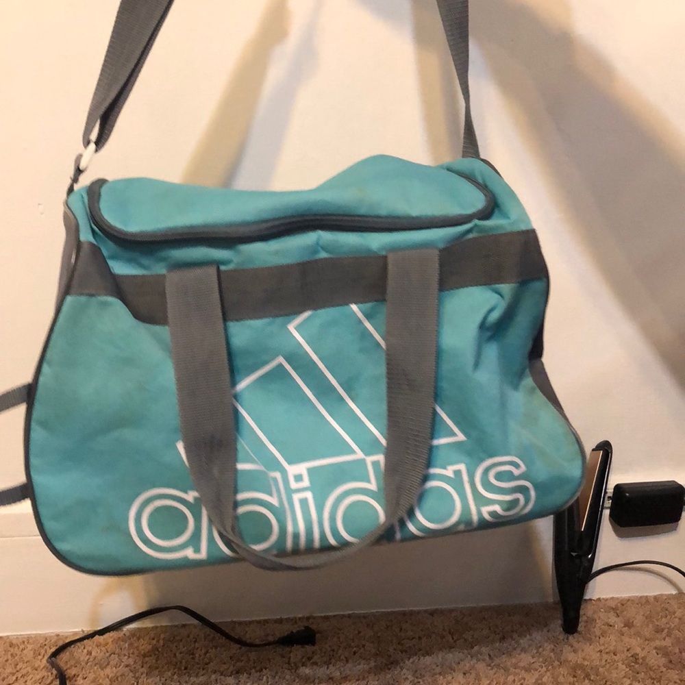 slightly stained(as shown in photo) travel bag